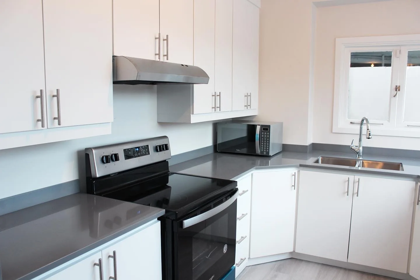 White and grey custom kitchen cabinetry